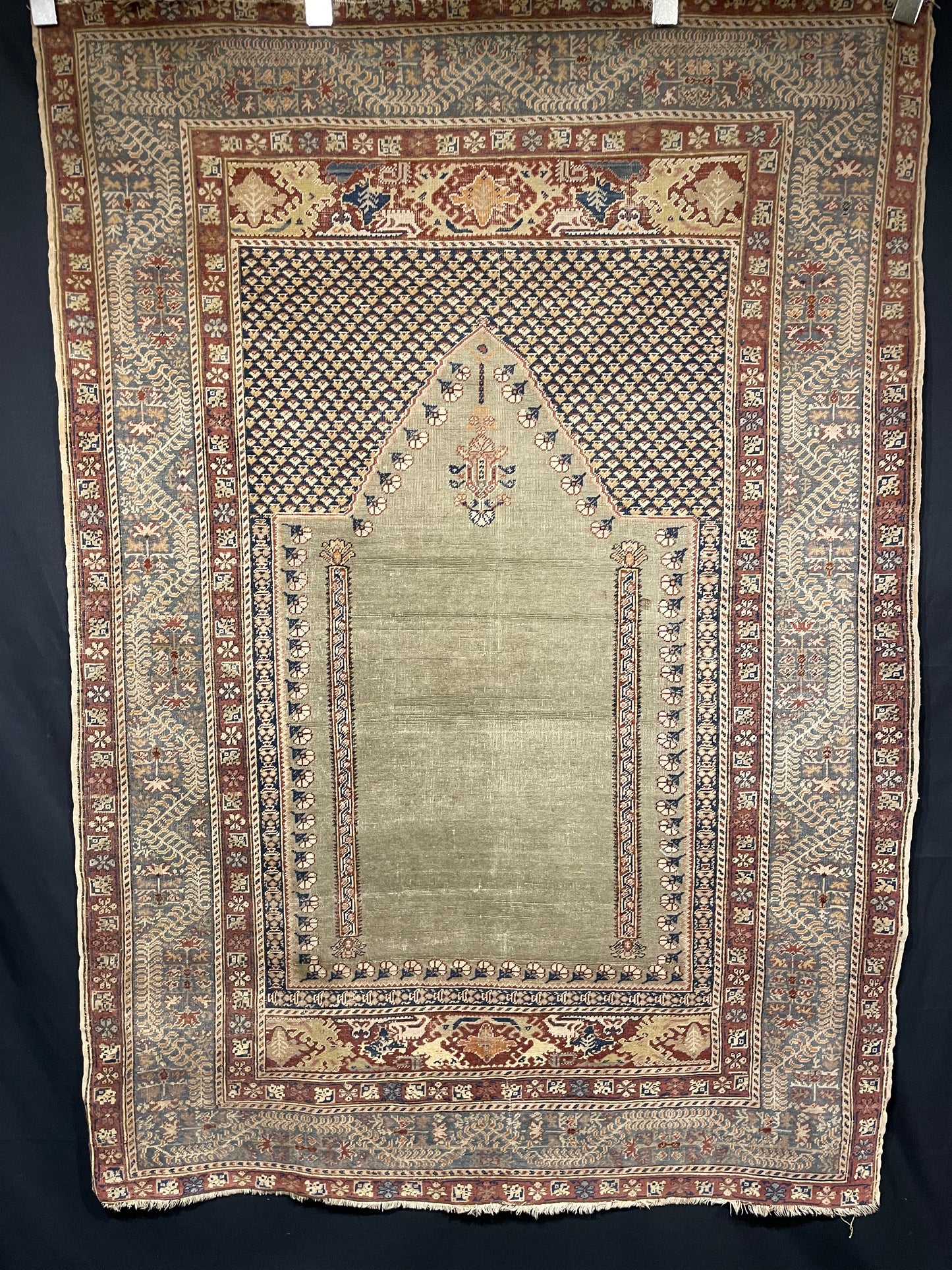 Antique Anatolian Ghiordes prayer rug
