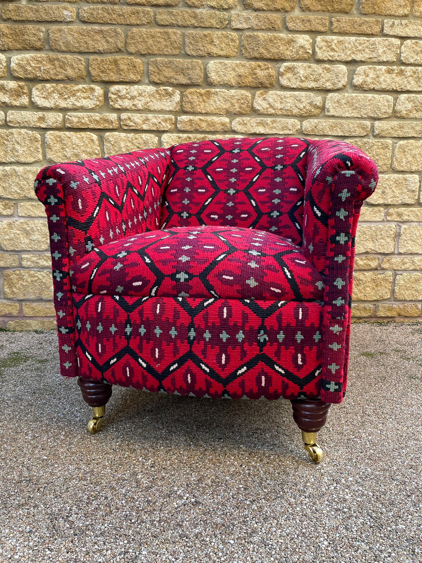 Tubchair Kilim covered with brass castors