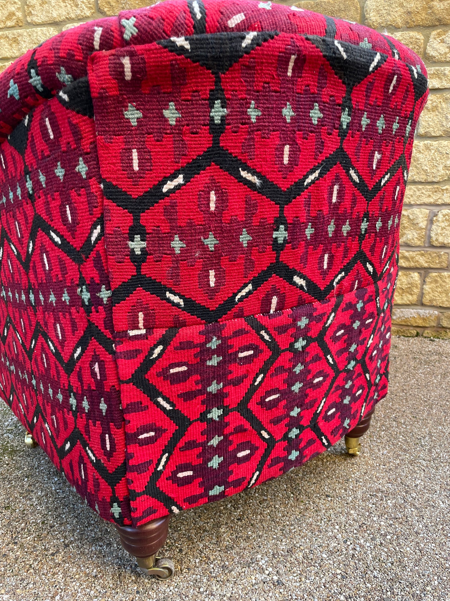 Tubchair Kilim covered with brass castors