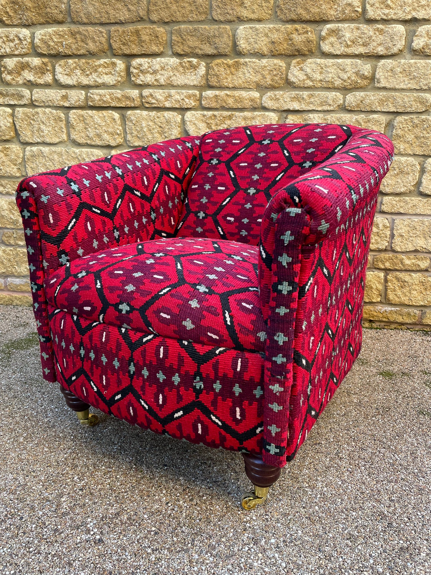 Tubchair Kilim covered with brass castors