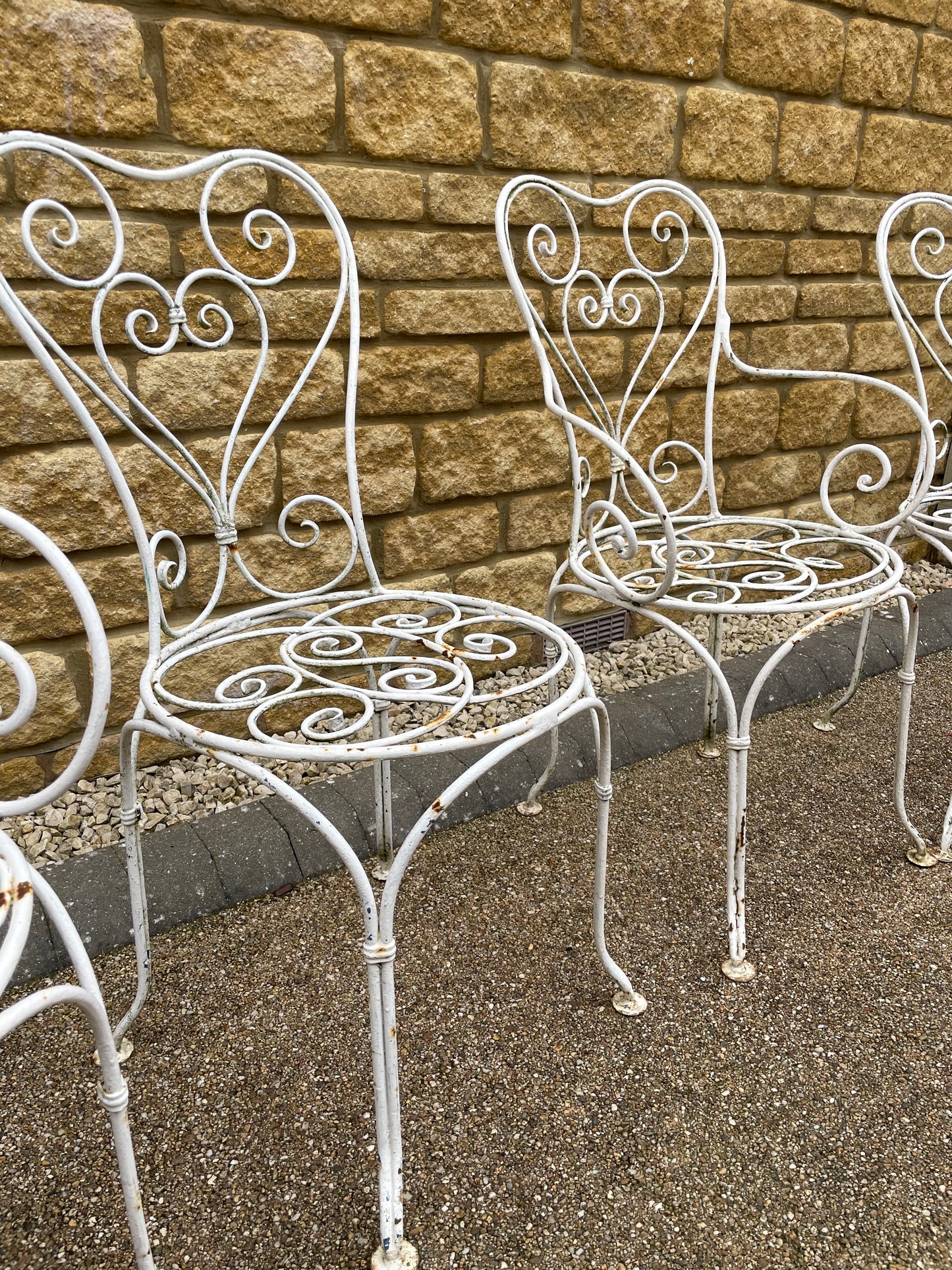 Vintage French Iron scrolled garden chairs x4