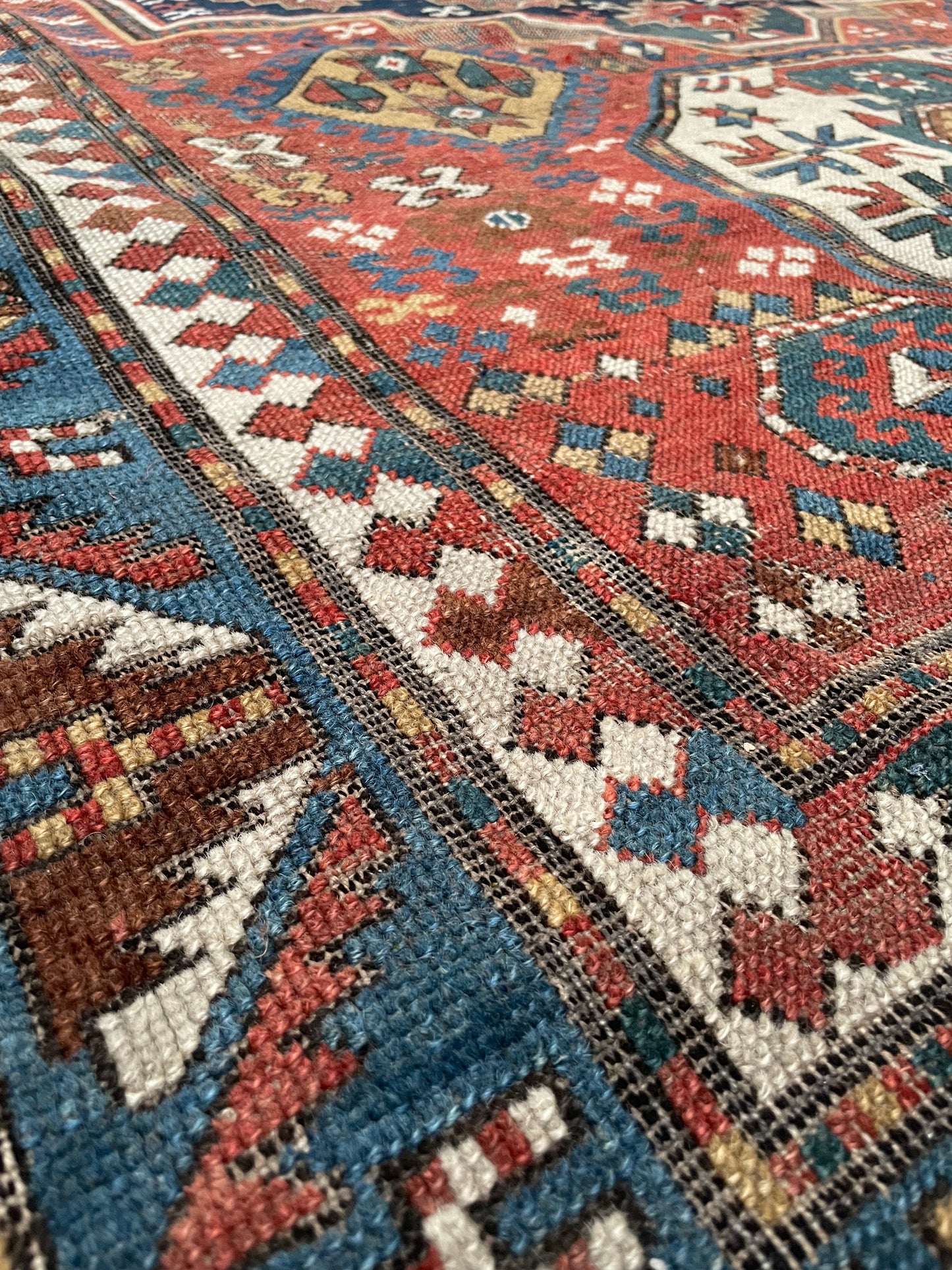 Antique Caucasian Triple Medallion Kazak Rug