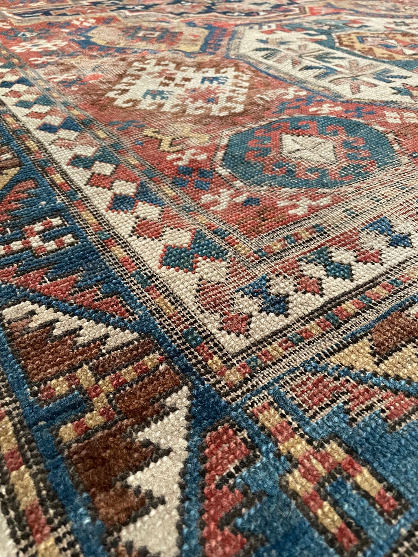 Antique Caucasian Triple Medallion Kazak Rug