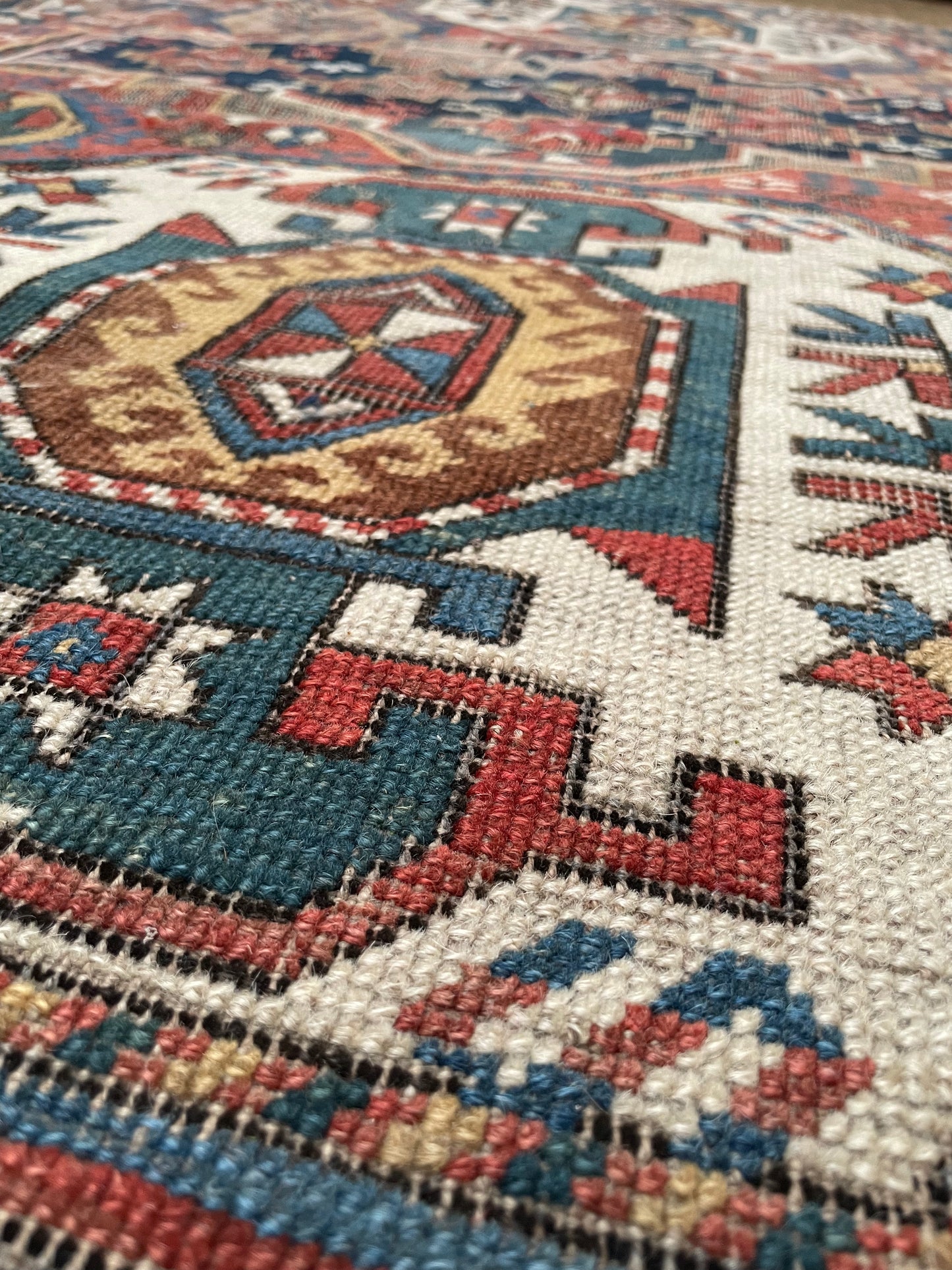 Antique Caucasian Triple Medallion Kazak Rug