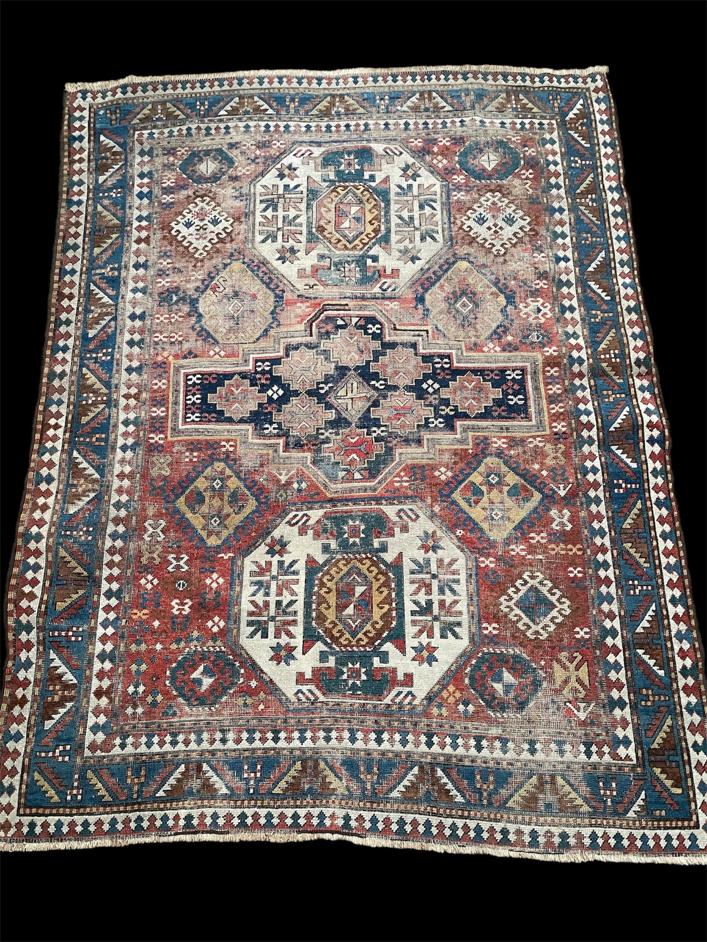 Antique Caucasian Triple Medallion Kazak Rug