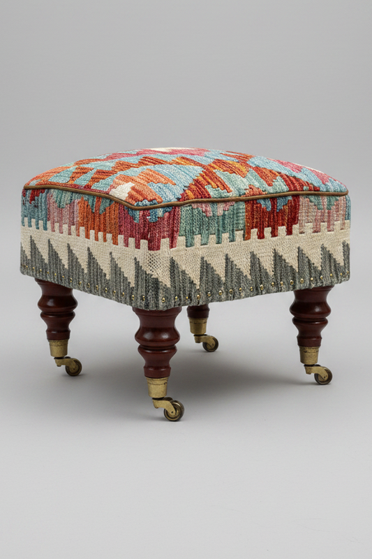 Kilim upholstered Ottoman/Stool on Brass Castors