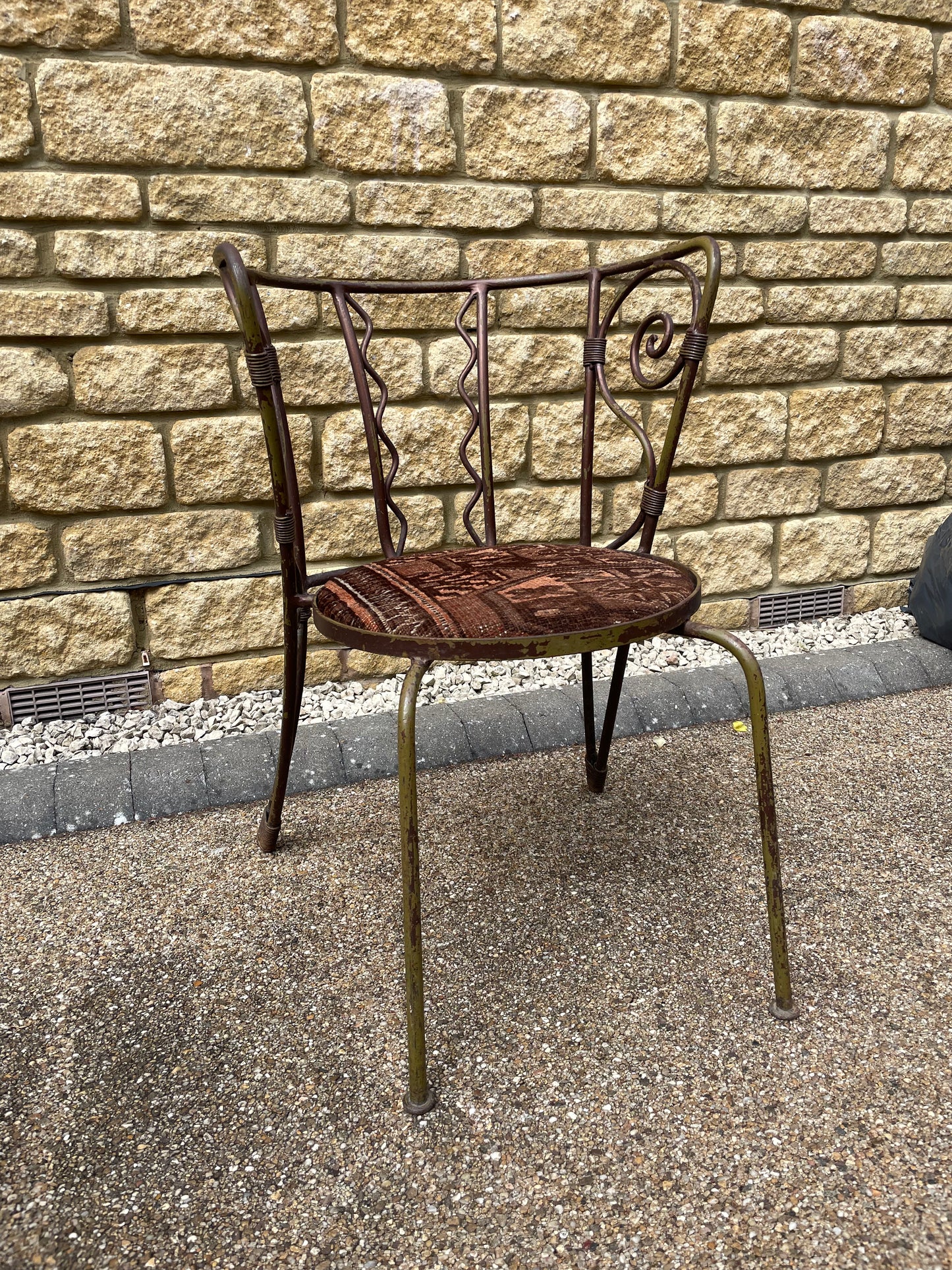 Quirky Wrought Iron Artisan Scrolling back Chair - Seat Upholstered in Antique Rug