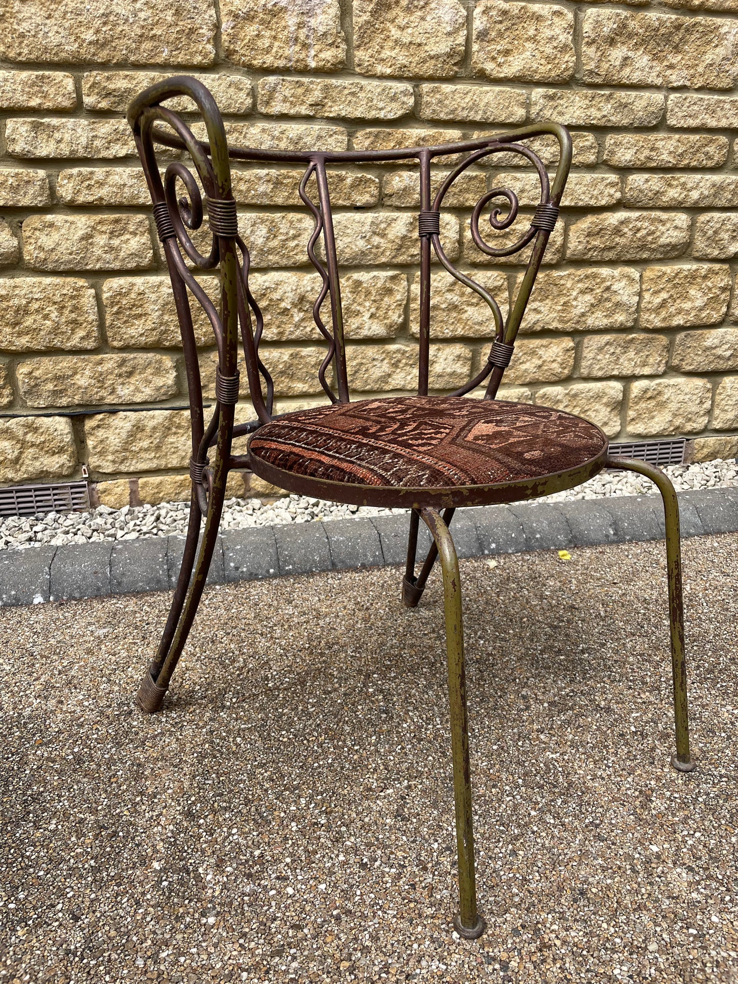 Quirky Wrought Iron Artisan Scrolling back Chair - Seat Upholstered in Antique Rug