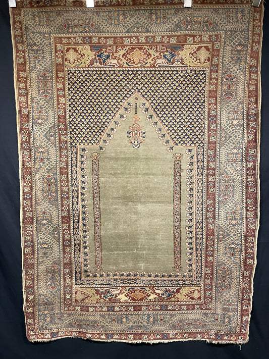 Antique Anatolian Ghiordes prayer rug